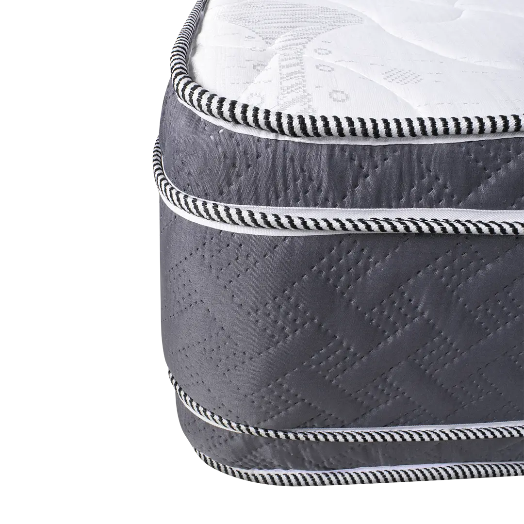 Vista lateral del Colchón Mercurio mostrando detalles de costuras y acabados premium